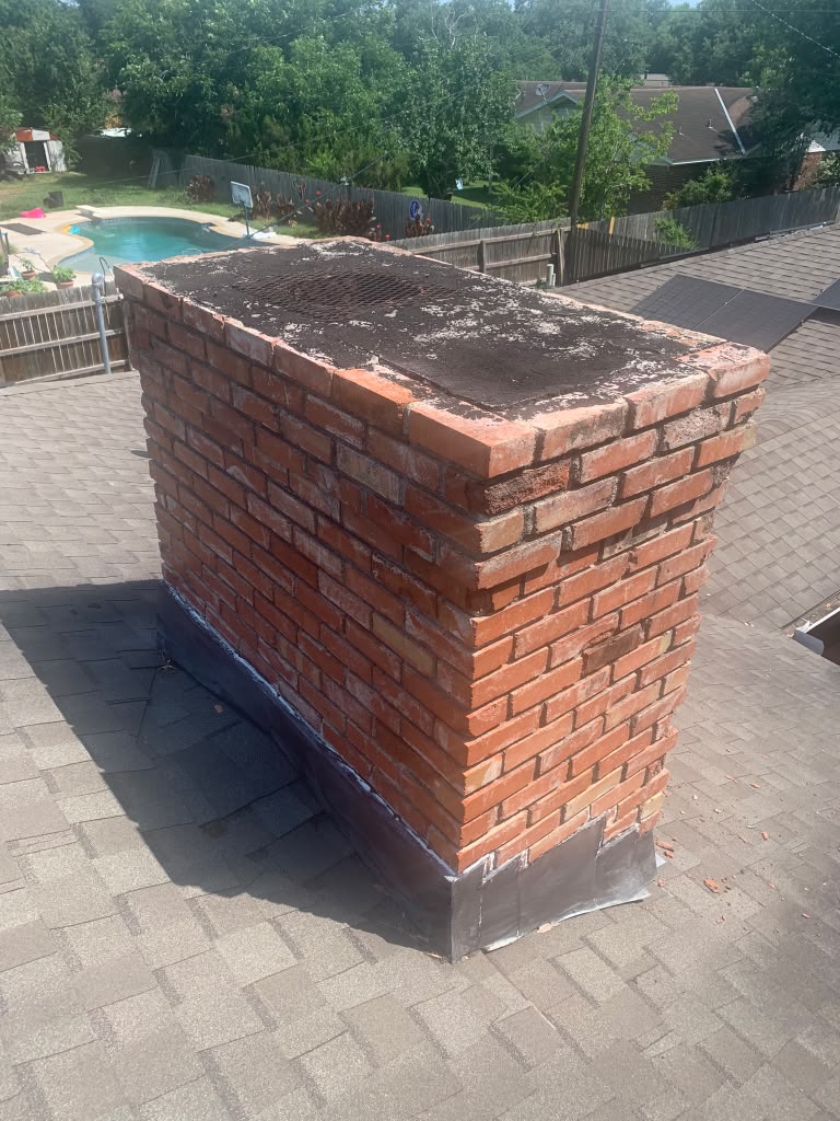 Houston chimney showing Gulf Coast humidity and salt-air damage before repair